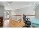 Bright office space with natural light, wooden floors, and a comfortable desk area at 2252 S Yosemite Cir, Denver, CO 80231