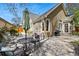 Spacious outdoor patio with seating area and barbecue grill at 2252 S Yosemite Cir, Denver, CO 80231