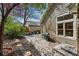 Backyard with a patio, seating area, and barbecue grill, perfect for outdoor entertaining at 2252 S Yosemite Cir, Denver, CO 80231