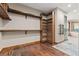 Custom closet with built-in shelving and wood trim at 7113 Echo Hills Club Rd, Larkspur, CO 80118