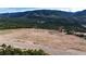 Vast, undeveloped land with scenic mountain views, perfect for creating your dream home or investment opportunity at 7113 Echo Hills Club Rd, Larkspur, CO 80118