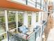 Inviting balcony featuring cozy seating and views of the park, ideal for relaxing and outdoor enjoyment at 1401 Delgany St # 204, Denver, CO 80202