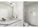 Clean and modern bathroom with a glass-enclosed shower, sleek vanity, and contemporary fixtures at 1401 Delgany St # 204, Denver, CO 80202