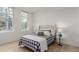 Brightly lit bedroom with big windows and a queen bed makes this space welcoming and comfortable at 1401 Delgany St # 204, Denver, CO 80202