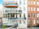 Exterior showcasing balconies and the building's architectural design at 1401 Delgany St # 204, Denver, CO 80202