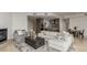 Open-concept living area seamlessly connects to a modern kitchen, offering a perfect space for entertaining at 1401 Delgany St # 204, Denver, CO 80202