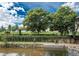 Scenic park view with lush greenery and a paved pathway, perfect for leisurely strolls and outdoor activities at 1401 Delgany St # 204, Denver, CO 80202