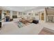 Basement area with a fireplace, a lounge area and open access to other parts of the basement at 5 Hillside Dr, Wheat Ridge, CO 80215