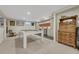 Spacious basement featuring a pool table and kitchenette, perfect for entertaining at 5 Hillside Dr, Wheat Ridge, CO 80215