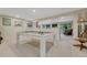 Entertaining basement with a pool table, kitchenette, and access to an outdoor space at 5 Hillside Dr, Wheat Ridge, CO 80215