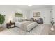 Bright, spacious bedroom featuring a soft color palette, neutral decor, and ample natural light at 16322 E Idaho Pl, Aurora, CO 80017