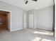 Spacious bedroom with neutral carpet and multiple doors at 2335 Walnut St # 10, Denver, CO 80205