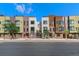 Modern townhome featuring mixed brick and modern architectural elements at 2335 Walnut St # 10, Denver, CO 80205