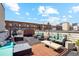 Rooftop deck with jacuzzi, furniture and open sky at 2335 Walnut St # 10, Denver, CO 80205