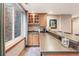 Basement bar featuring seating and granite countertops at 2411 S Garfield St, Denver, CO 80210