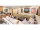 Relaxing finished basement with sectional seating, tv and decor at 2411 S Garfield St, Denver, CO 80210