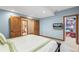 Comfortable bedroom with convenient access to an en-suite bath and closet for storage and easy living at 2411 S Garfield St, Denver, CO 80210