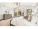 Bright bedroom with large windows, and ceiling fan at 2411 S Garfield St, Denver, CO 80210