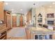 Spacious kitchen featuring a large island, bar seating, and modern appliances, ideal for entertaining and meal preparation at 2411 S Garfield St, Denver, CO 80210