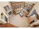 Bright living room featuring a fireplace, large windows, and comfortable seating at 2411 S Garfield St, Denver, CO 80210