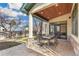 Charming outdoor patio with stone flooring and elegant dining set, perfect for entertaining at 2411 S Garfield St, Denver, CO 80210