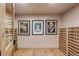 Walk-in wine cellar with tile floor and wooden bottle racks at 2411 S Garfield St, Denver, CO 80210