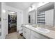 Bright bathroom features double sinks and a spacious walk-in closet at 23500 E Alamo Pl # B19, Aurora, CO 80016