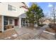 Charming townhome exterior with a welcoming front porch and attractive landscaping at 23500 E Alamo Pl # B19, Aurora, CO 80016
