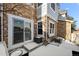 The patio features a stone exterior, sliding glass doors, and outdoor space for relaxation at 23500 E Alamo Pl # B19, Aurora, CO 80016