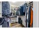 Walk-in closet with custom shelving and ample storage space for clothes and accessories at 23500 E Alamo Pl # B19, Aurora, CO 80016