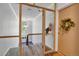 The building hallway features an entryway, with secure doors, carpeted floors, and hallway entrance at 1201 Race St # 10, Denver, CO 80206