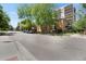 Exterior shot of the brick apartment complex and street at 1201 Race St # 10, Denver, CO 80206