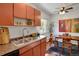 Efficient kitchen with stainless steel sink and view to the dining area for easy conversation at 1201 Race St # 10, Denver, CO 80206