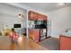 Functional kitchen with stainless steel appliances and view into the cozy living area at 1201 Race St # 10, Denver, CO 80206