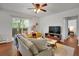 Beautiful living room with large windows, hardwood floors and comfortable seating, perfect for relaxing at 1201 Race St # 10, Denver, CO 80206