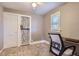 Cozy bedroom with carpet, built-in storage, and a comfortable workspace at 3930 S Sherman St, Englewood, CO 80113