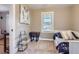 Neutral bedroom featuring carpet, a daybed with storage, and a bright window at 3930 S Sherman St, Englewood, CO 80113