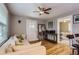 Comfortable living room showcasing hardwood floors, neutral color palette, and lots of natural light at 3930 S Sherman St, Englewood, CO 80113