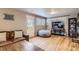 Comfortable living room featuring hardwood floors, cozy seating, and a bright, airy atmosphere at 3930 S Sherman St, Englewood, CO 80113