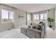 Living room filled with natural light, showcasing contemporary furnishings and stylish decor at 10910 Touchstone Loop, Parker, CO 80134