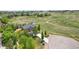 Expansive property featuring a stunning home, lush greenery, and easy access to nearby trails at 14958 Wistera Way, Broomfield, CO 80023