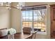 Dining area window showcases mountain views and natural light at 14958 Wistera Way, Broomfield, CO 80023