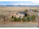 Beautiful two-story home with manicured landscaping and mountain views at 14958 Wistera Way, Broomfield, CO 80023