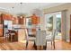 Modern kitchen with stainless steel appliances, granite countertops, and a spacious island, perfect for cooking at 14958 Wistera Way, Broomfield, CO 80023