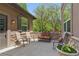 Cozy outdoor patio with ample seating, perfect for relaxing and enjoying the tranquil setting at 14958 Wistera Way, Broomfield, CO 80023