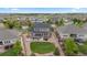Aerial view of backyard, deck, patio and firepit on this property at 23252 E Glidden Dr, Aurora, CO 80016