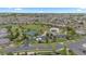 Aerial view of community park with tennis court, playground, and green space for recreation at 23252 E Glidden Dr, Aurora, CO 80016