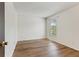 Bedroom showcasing vinyl plank flooring, white walls, and a window at 6650 E Arizona Ave # 203, Denver, CO 80224