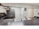 View of kitchen with stainless steel stove, light-colored sink, and gray countertops at 6650 E Arizona Ave # 203, Denver, CO 80224