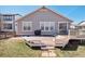 The backyard has a spacious deck, perfect for outdoor entertaining and relaxation at 4834 S Wenatchee St, Aurora, CO 80015